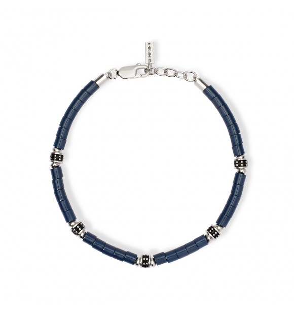 Pulsera de plata 925 rodiada con cilindros de cerámica azul de 4xØ4 mm,
 elementos de 3,5x5 mm y circonitas negras de 1,5 mm, longitud regulable de 19 a 21 cm